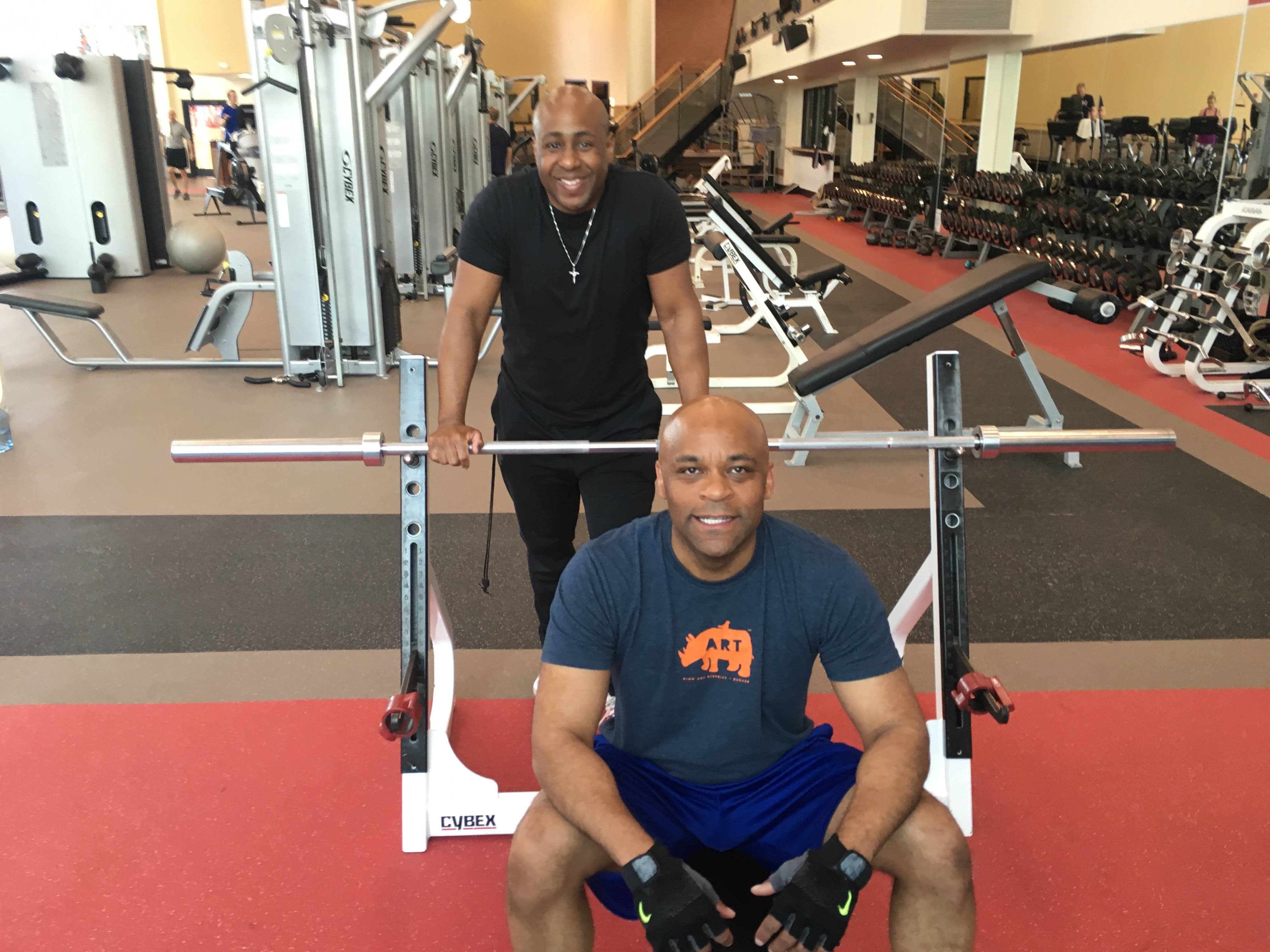 Eric with former Mayor Michael Hancock in the gym
