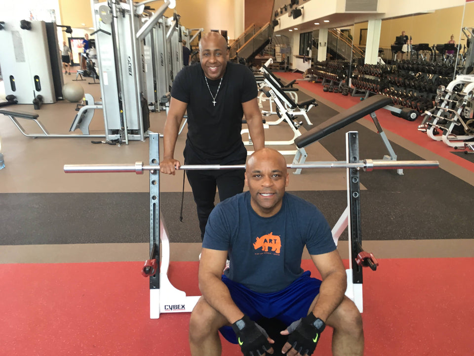 Eric with former Mayor Michael Hancock in the gym